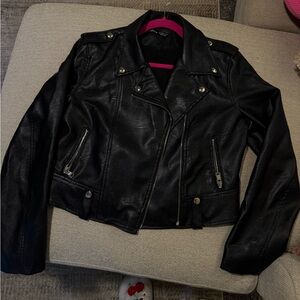 Chic Black leather Jacket with Silver Accents